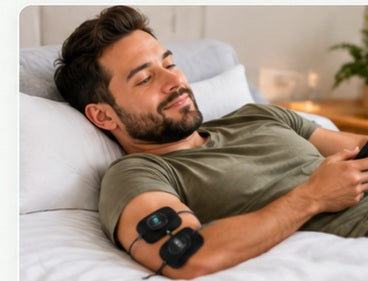 Person using an EMS muscle stimulation device at home