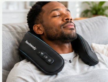 Person relaxing while using a neck massager